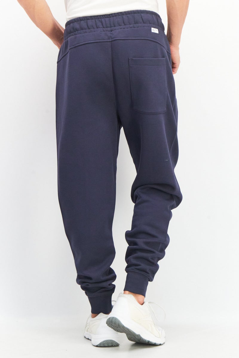 PUMA سروال رياضي للرجال، مناسب للتدريب، لون أزرق داكن - Image 2